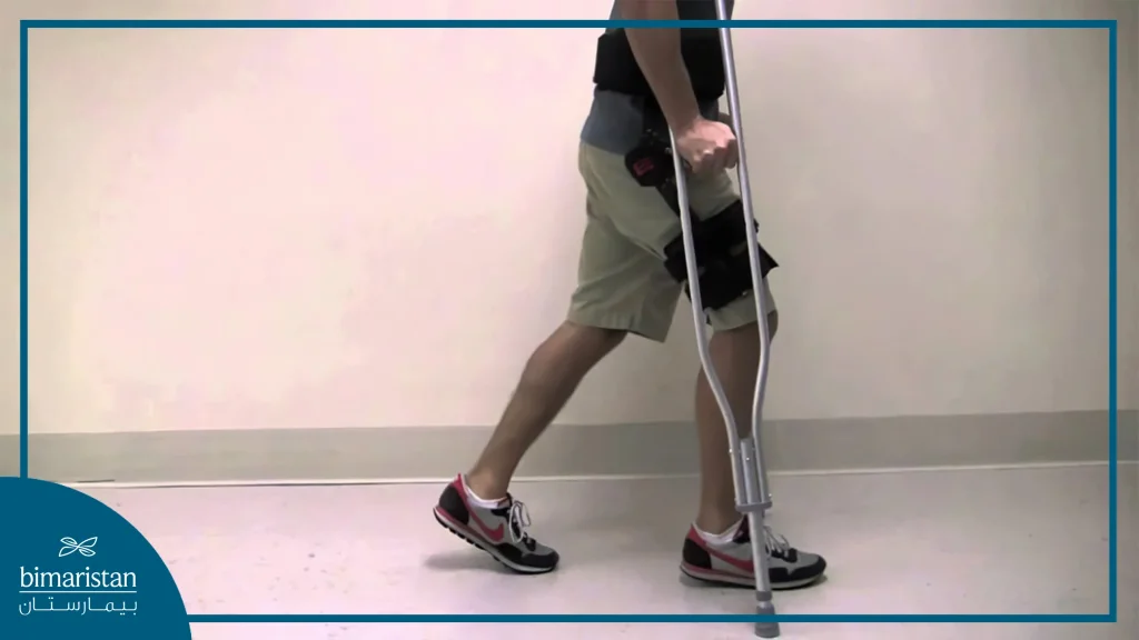 An Image Showing A Man Using A Hip Brace And Crutches To Walk After Hip Arthroscopy.