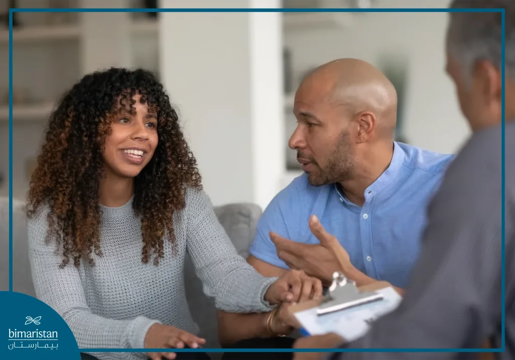 A Couple During A Therapy Session To Discuss The Challenges Of Sexual Addiction And Enhance Therapeutic Communication.